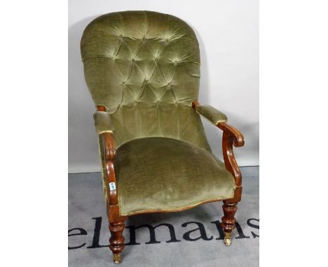 A late Victorian mahogany framed low open armchair, with green button back upholstery,98cm high x 62cm wide.