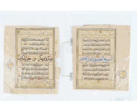 Two folios from a Quran manuscript, black and blue script with gilt and red highlights, each approx. 16cm x 13cm overall size