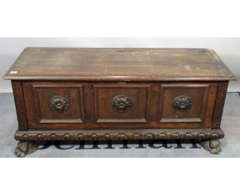 A modern oak coffer, 124cm wide x 41cm high, and a modern stained beech sliding top trunk, on bun feet, 120cm wide x 49cm hig