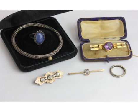 An amethyst bar brooch, an aquamarine bar brooch, a silver bangle and three items of costume jewellery