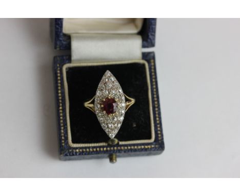 An Edwardian ruby and old cut diamond navette shaped ring