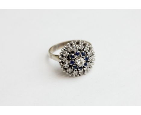 A sapphire and diamond 'ballerin' cluster ring in white gold