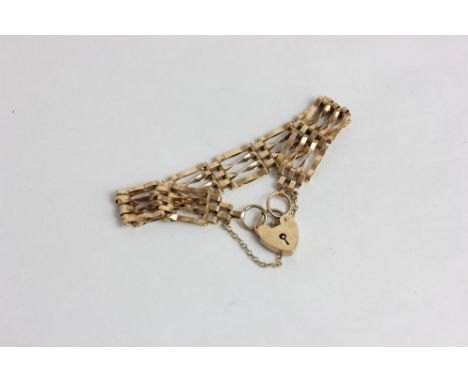A 9ct gold gate link bracelet with padlock clasp 11g