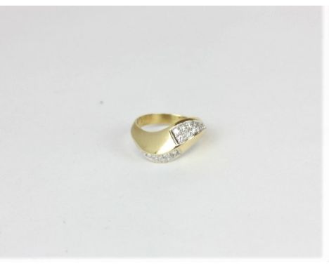 A diamond ring pave set with two sections of eight cut diamonds