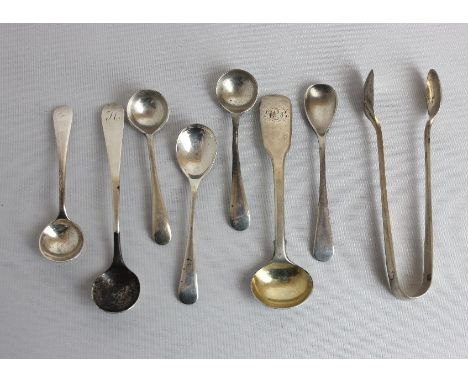 A William IV silver mustard spoon five other cruets spoons, a plated salt spoon and a pair of George V silver sugar tongs