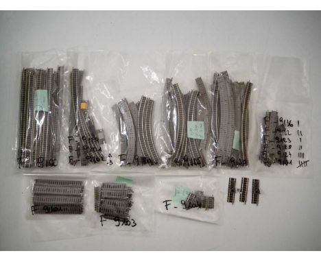 A large quantity of unboxed FLEISCHMANN Piccolo N gauge track comprising straights, curves etc, circa 100 pieces plus, most a