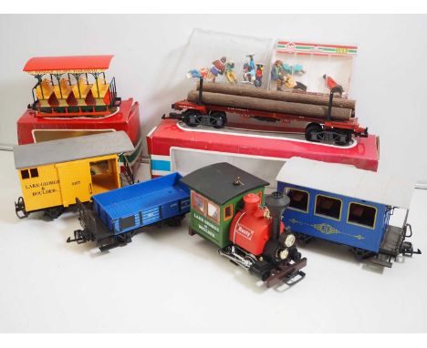 A mixed group of LGB G gauge rolling stock to include 41660 timber wagon with load, a 30430 Grizzly Flats Sightseeing Passeng