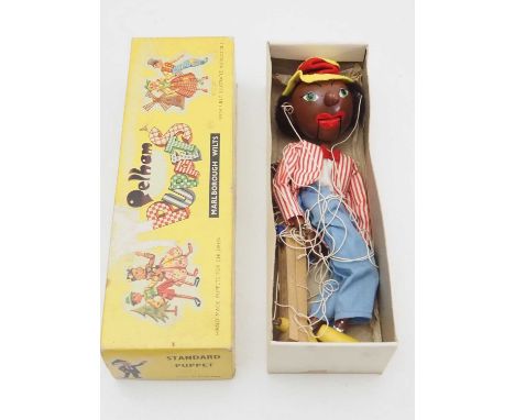 A vintage PELHAM PUPPET SM Singing Minstrel (without Banjo) in yellow snake charmer box - G in F/G box