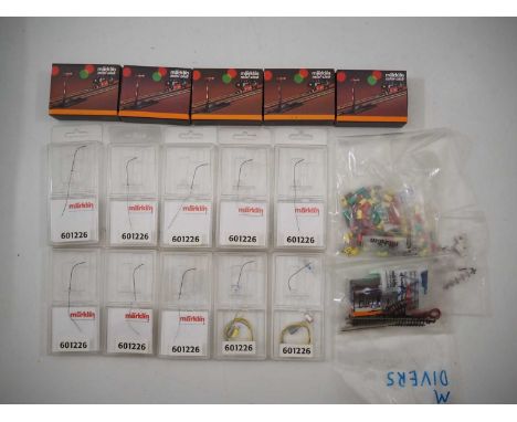 A group of MARKLIN Z gauge accessories to include electric signals, street lights and other electrical items - G/E in G boxes