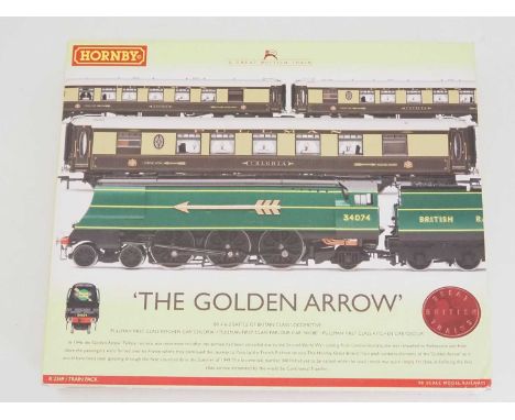 A HORNBY OO gauge 'The Golden Arrow' R2369 Train Pack comprising a Battle of Britain Class steam locomotive, tender and 3 Pul