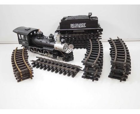 A group of unboxed G gauge model railway items by BACHMANN and LGB comprising Rio Grande steam loco and tender together with 