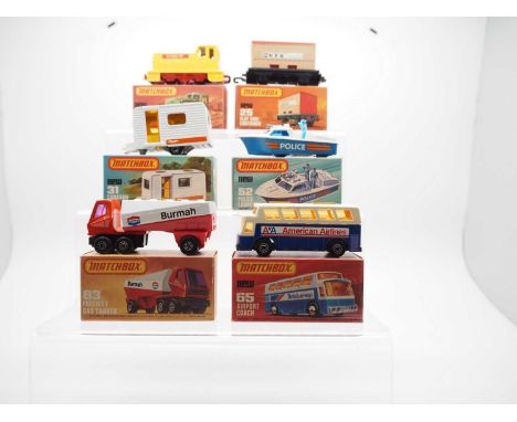 A group of MATCHBOX Superfast series vehicles comprising: 24 Diesel Shunter, 25 Flat Car / Container, 31 Caravan, 52 Police L