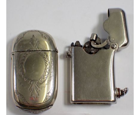 A Thorens silver plated lighter and a silver plated vesta 
