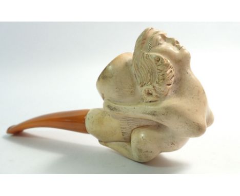 An amber and meerschaum pipe with carved ships maiden masthead - uncased with associated leaflet 
