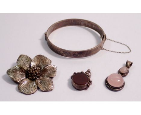 A Miracle flower brooch, a white metal stone set fob, a silver and pink quartz pendant and a silver bangle