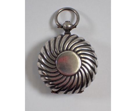 A silver spiral reeded circular sovereign case, London 1885 by Sampson Mordan