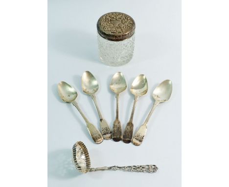 A small group of silver including spoons, sugar sifter and silver topped glass jar, 104g