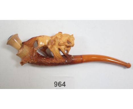 A large amber and meerschaum pipe with carved lady and horse - cased 