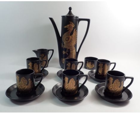 A Portmeirion coffee set The Phoenix by John Cuffley comprising coffee pot, milk, sugar and six cups and saucers