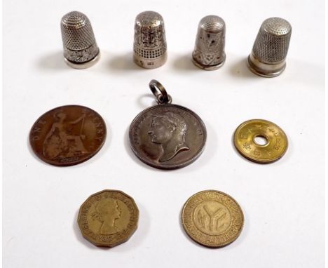 A Napoleon 1807 Paix et Commerce medallion, a Chinese coin, a New York NYC token, two silver thimbles etc.