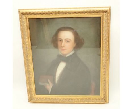 A 19th century pastel portrait of young gentleman holding a book, 75 x 61cm in gilt frame