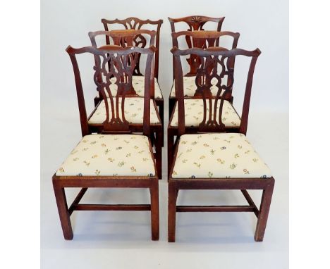 Two pairs of Georgian Chippendale style mahogany dining chairs and two singles all upholstered to match in cream floral fabri