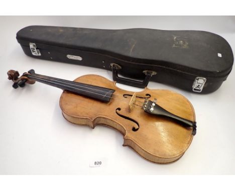 A 19th century German violin in fitted case, 14 inch back, with label after Stradivarius