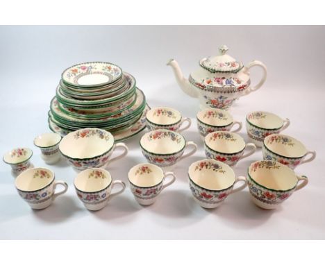 A group of Copeland Chinese Rose comprising teapot, dinner plate, bowl, cake plate, four dessert plates, three dishes, two te