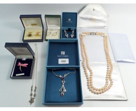 A group of boxed costume jewellery including Past Times necklace and earrings plus a silver and marcasite necklace set pink s