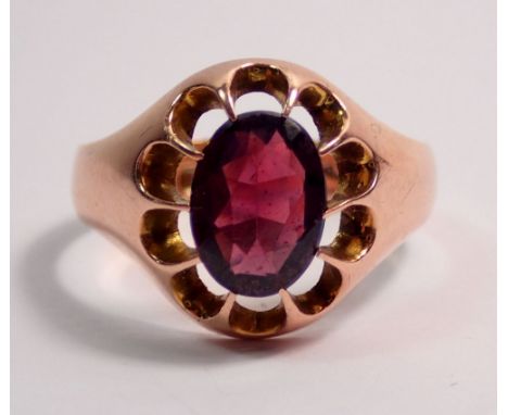 A 9 carat rose gold ring claw set oval cut amethyst, size R, 4.8g