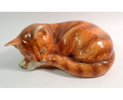 A Goebel large sleeping cat, 22cm wide