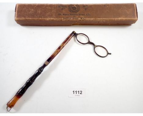 A Victorian long handled tortoiseshell lorgnette 