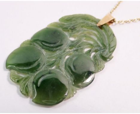 A jade pendant necklace with 9 carat gold chain, 4.5 x 3cm, chain 45cm long, chain 1.9g