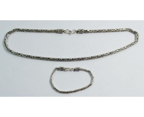 A heavy silver fancy link bracelet and necklace, 82g
