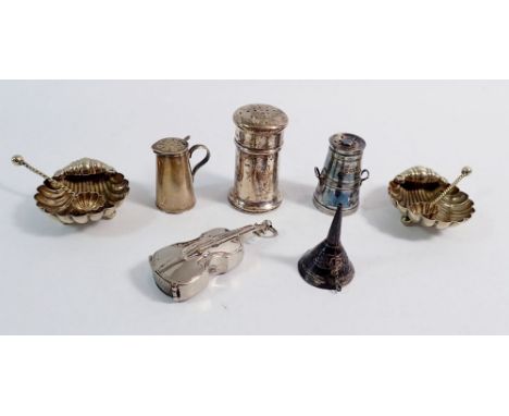 A novelty silver milk churn pepper pot, a jug form pepper pot and one other pepper, two silver shell form salts and spoons - 