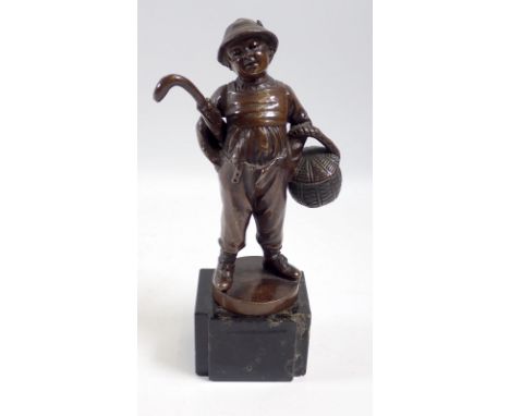 R W Lange (1879-1944) - bronze boy with basket and umbrella on marble base, 15cm tall