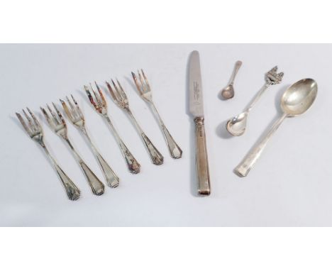 A set of six 900 standard silver cake forks, three various spoons and a silver handled knife