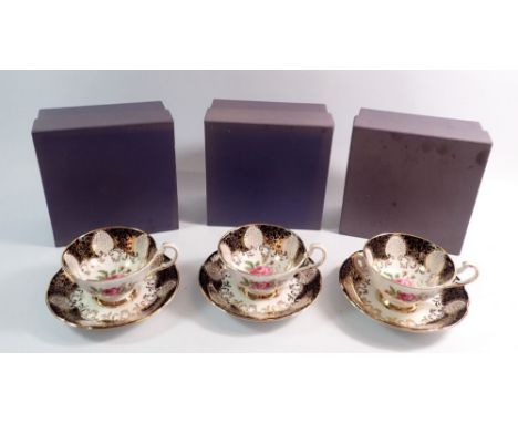 Three Paragon floral cabinet cups and saucers, boxed