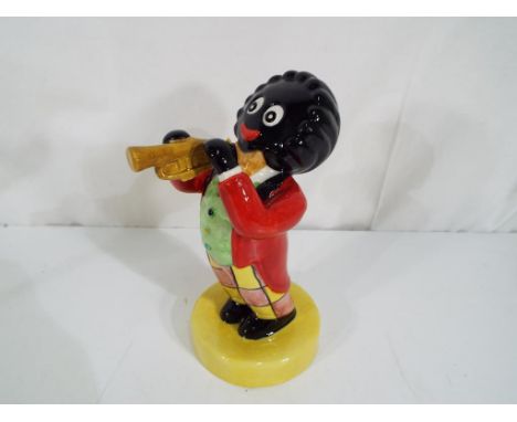 Carlton ware - a Carlton ware advertising figurine playing the trumpet. Estimate £40 - £60   - This lot MUST be paid for and 