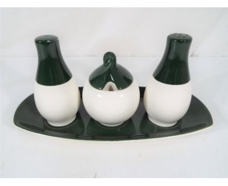 Carlton Ware - a five piece cruet set by Carlton Ware decorated in green and white (5)   - This lot MUST be paid for and coll