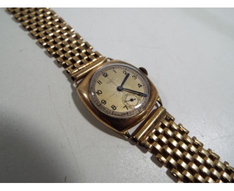 Rotary - a gentleman's wristwatch and bracelet, the watch case of yellow metal and marked 12543, the bracelet bearing Birming