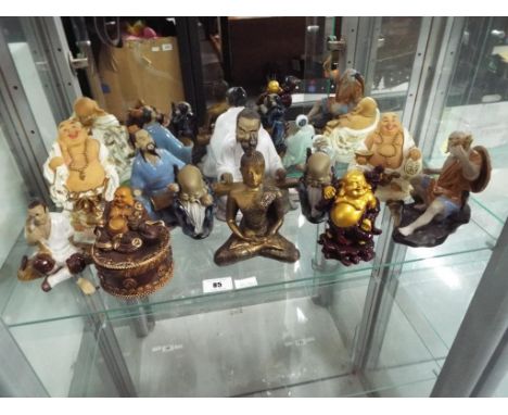A quantity of ceramic Japanese figurines and Buddha - This lot MUST be paid for and collected, or delivery arranged, no later