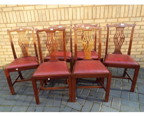 A set of six Edwardian Chippendale style dining chairs with pierced back splats and red drop-in seats - Est £50 - £80  - This