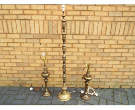 A pair of brushed yellow metal matching table lamps and a brass floor standing lamp. (3) - This lot MUST be paid for and coll