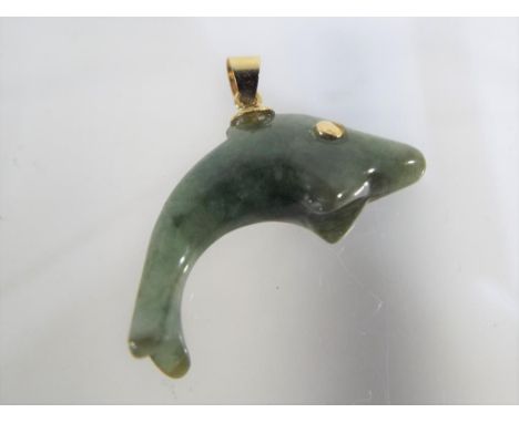 A 14ct gold and jade pendant shaped like a dolphin   - This lot MUST be paid for and collected, or delivery arranged, no late