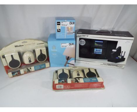 Unused retail stock - two wireless portable speaker sets  with FM radios by Pod Sound, a 4 Gamers Home Entertainment Centre w