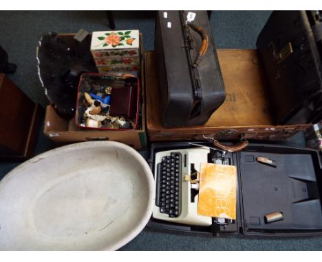 A good mixed lot to include a vintage baby bath, vintage suitcase and doctor's bag, a quantity of sewing equipment and button