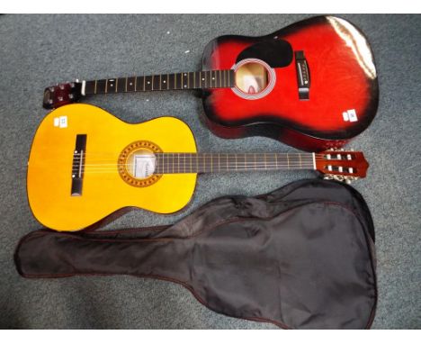 A Stagg acoustic guitar model No. SW201RDS and a Herald acoustic guitar, model No. HL44 in carry case (2) - This lot MUST be 