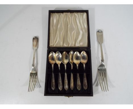 A George VI cased set of six hallmarked coffee spoons Sheffield Assay 1943, a hallmarked silver fork, Sheffield Assay 1894 an