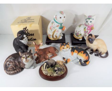 Two boxed Franklin Mint porcelain figurines entitled 'The Imperial Monkey of Satsuma', 'The Royal Kitten of Prosperity' with 